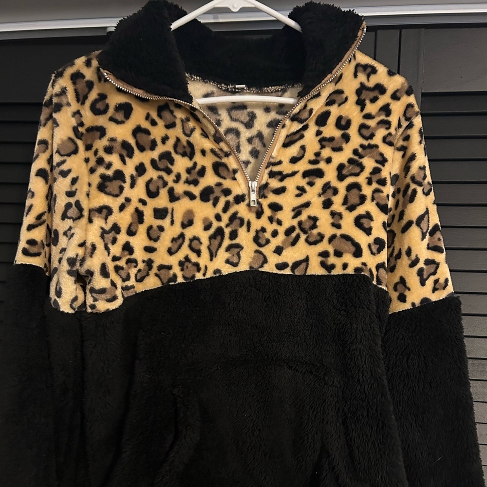 Cheetah/black fluffy jacket. Size medium.